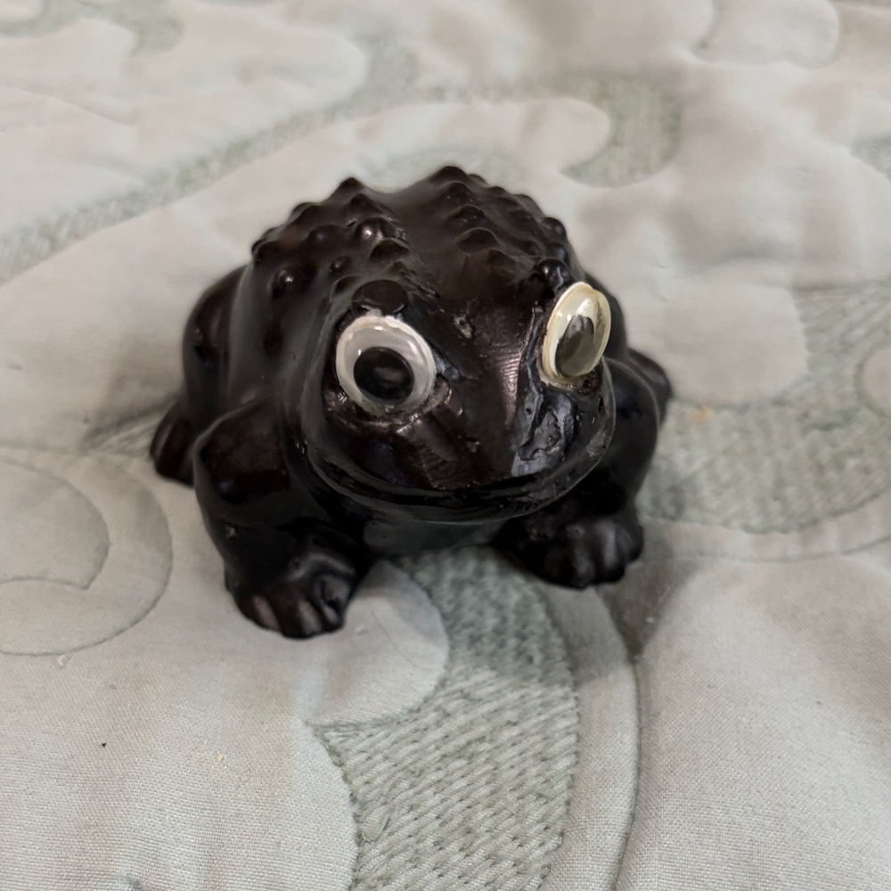 Hand crafted hard black coal toad